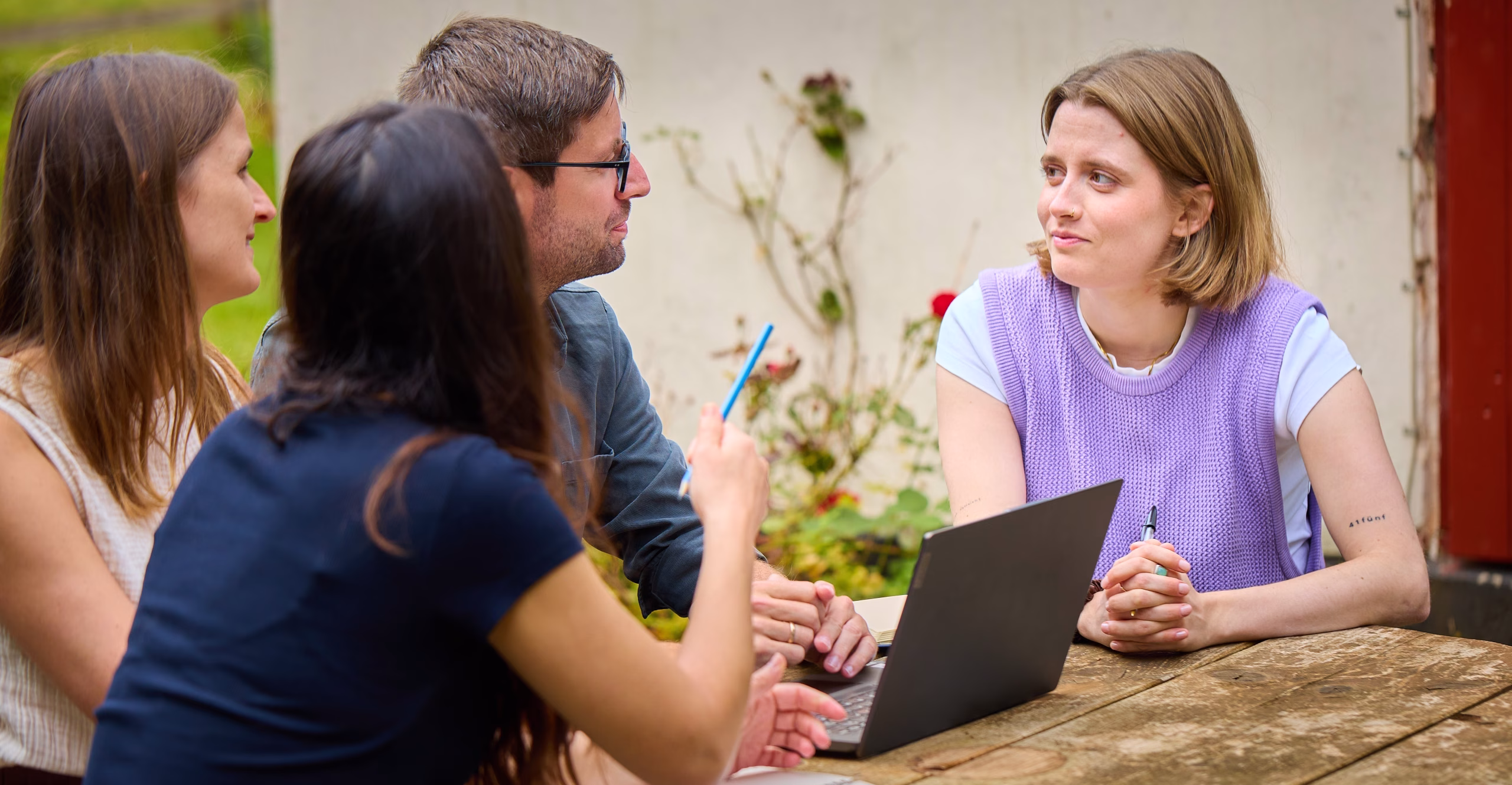 Meeting in small courtyard